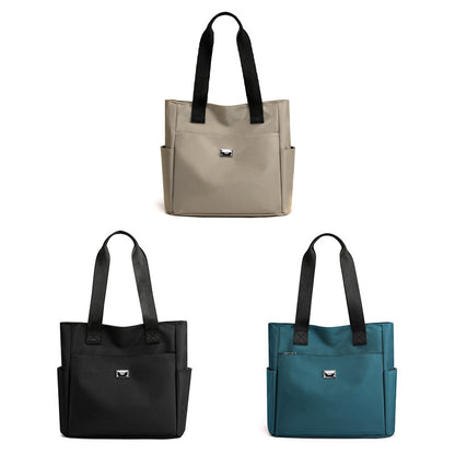 Lätt och vattentät axelväska i nylon